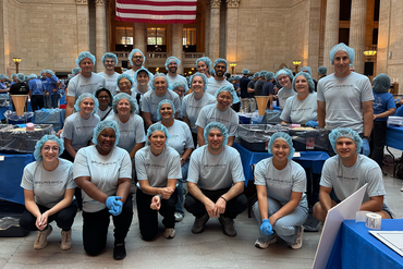 Brunswick Employees Pack 500,000 Meals for Chicago Families